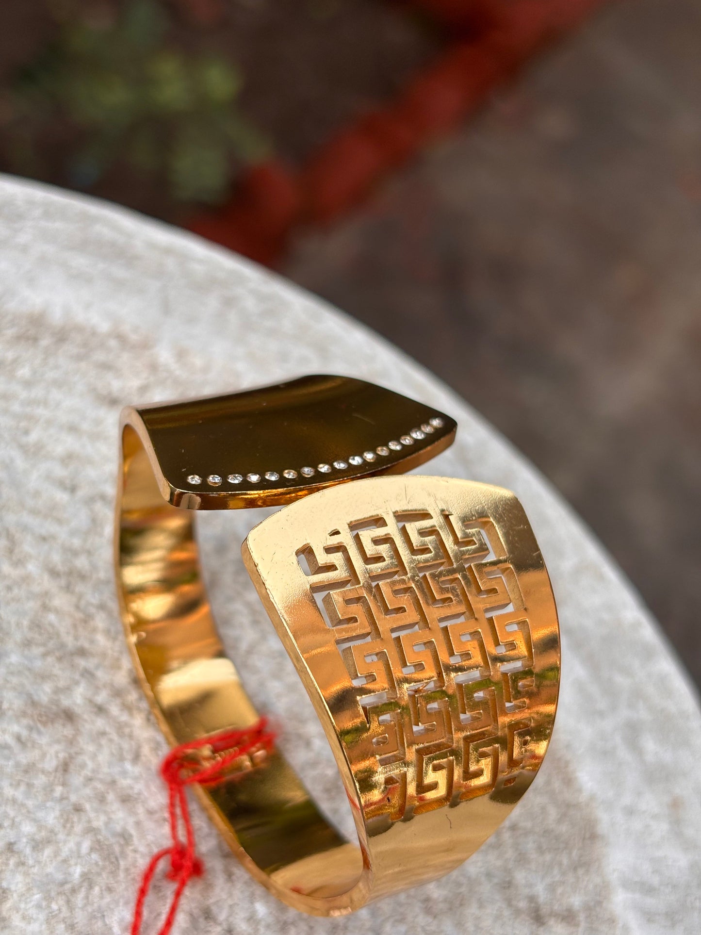 Gold Wide Bracelet with Geometric Cutwork and Stone Accents