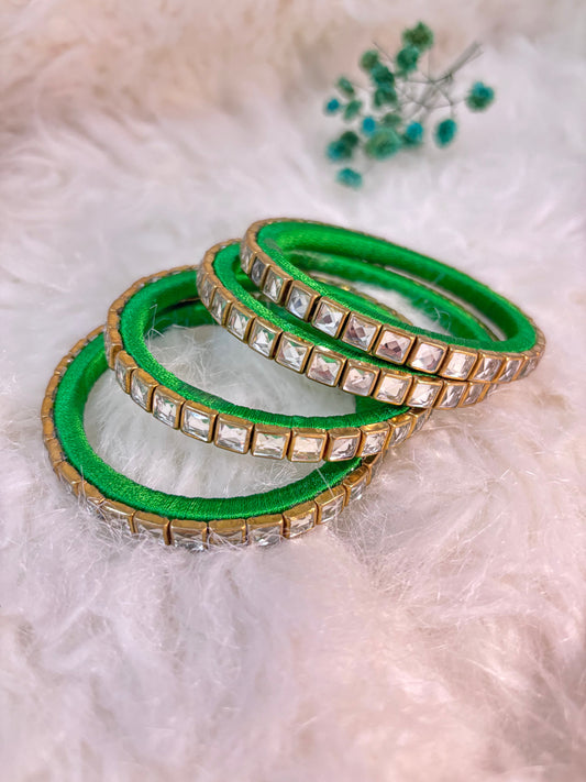 Green full kundan work thread bangles