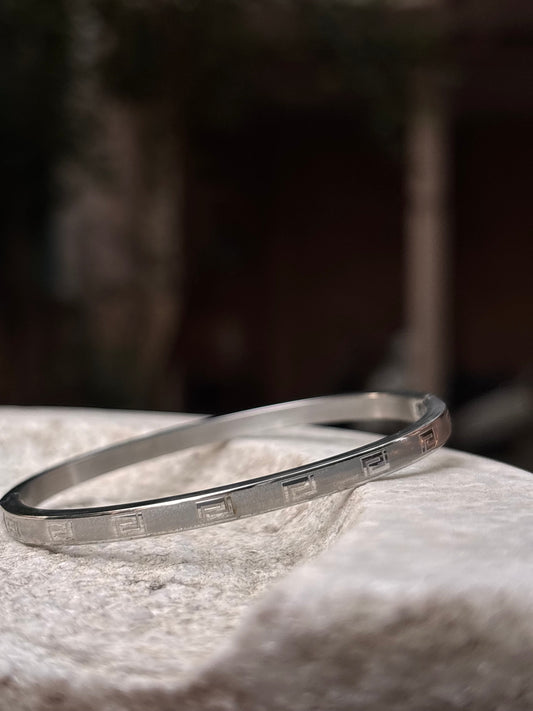 Minimalist Silver Bangle with Geometric Engravings